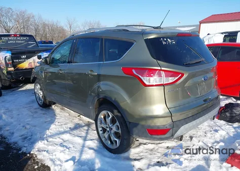 2013 Ford Escape Titanium z USA, uszkodzony, nr VIN 1FMCU0J96DUD41797